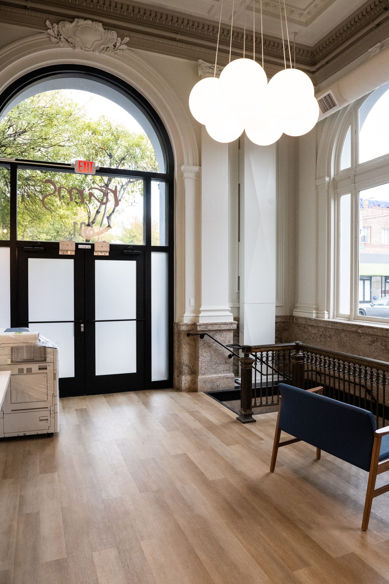 Front entry with the original doors and bench