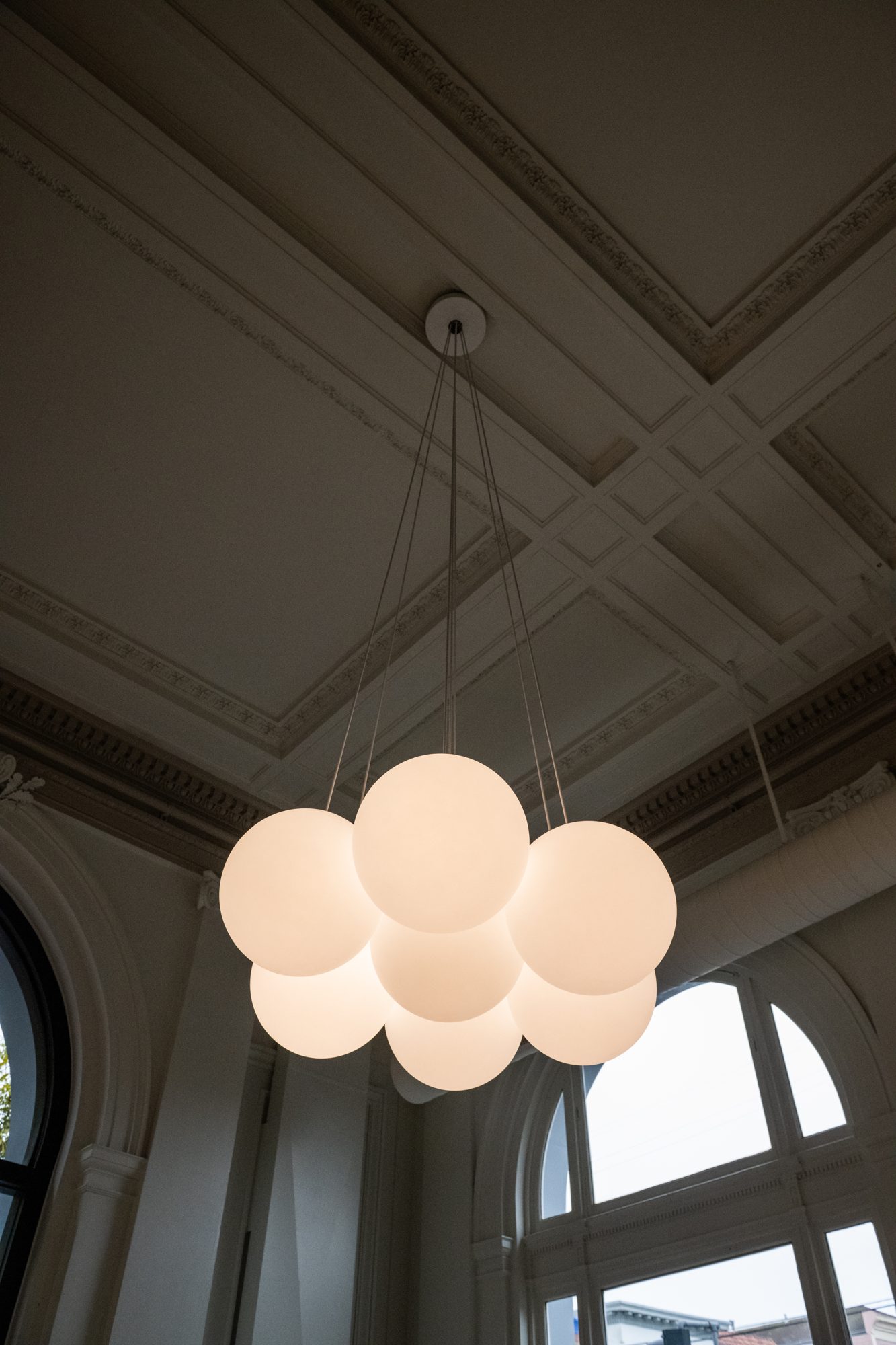 Plaster coffered ceiling and new globe pendant cluster